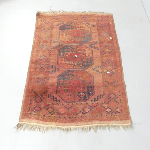 2137 - A red-ground Afghan rug. 149x102cm.