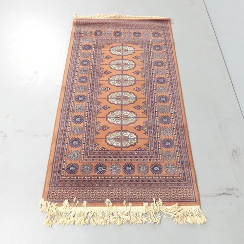 2140 - A red-ground Afghan rug. 160x83cm.