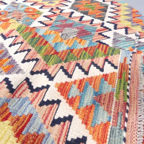 2149 - A Chobi Kilim rug. 155x107cm.