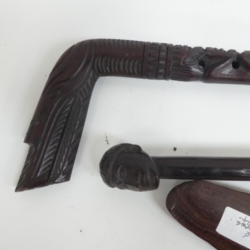 903 - A 1930s Australian carved wood boomerang, plus 2 hardwood African walking sticks, 1 with a Native he... 