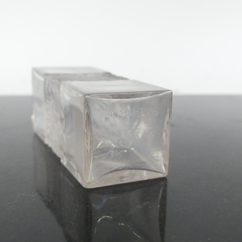 487 - R LALIQUE FRANCE - a rectangular scent bottle and stopper, having a moulded child and tree design ce... 