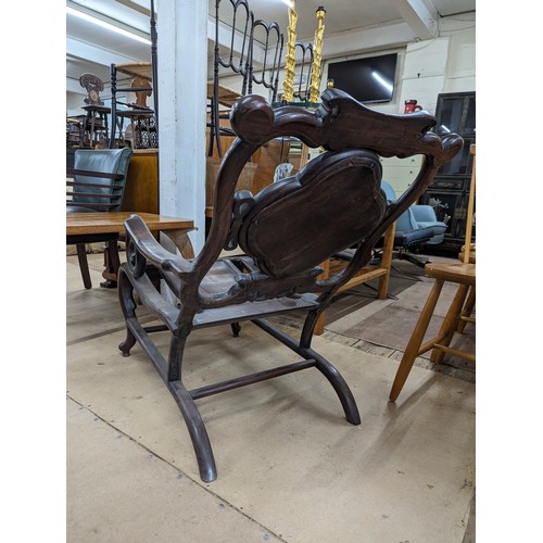 2099 - A Chinese hardwood lounge chair, with marble panelled back and carved and pierced decoration. Overal... 