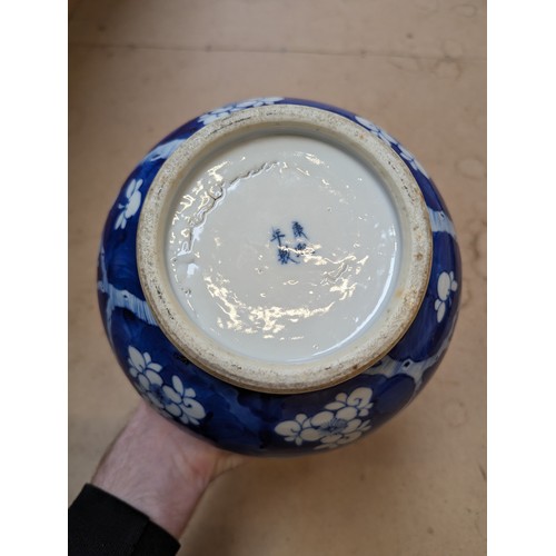 797 - A Chinese blue and white Prunus pattern vase, with 4 character mark, H35cm, repaired rim chip and cr... 