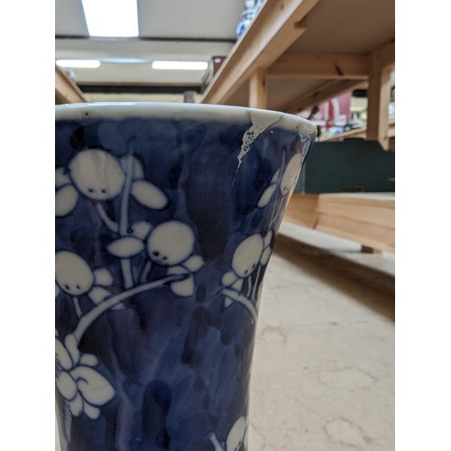 797 - A Chinese blue and white Prunus pattern vase, with 4 character mark, H35cm, repaired rim chip and cr... 