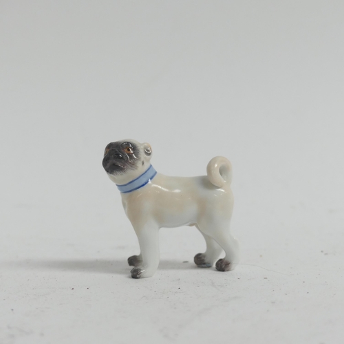 1097 - A group of 3 Meissen porcelain dog figurines, all stamped to the underside with crossed blue swords,... 