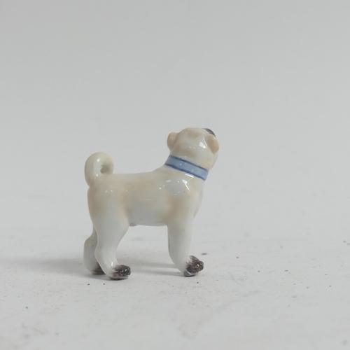 1097 - A group of 3 Meissen porcelain dog figurines, all stamped to the underside with crossed blue swords,... 