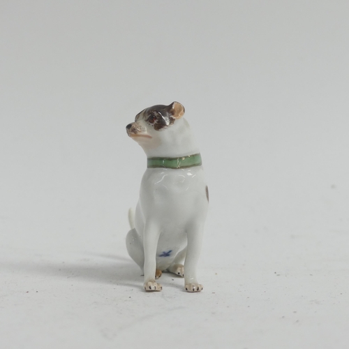 1097 - A group of 3 Meissen porcelain dog figurines, all stamped to the underside with crossed blue swords,... 