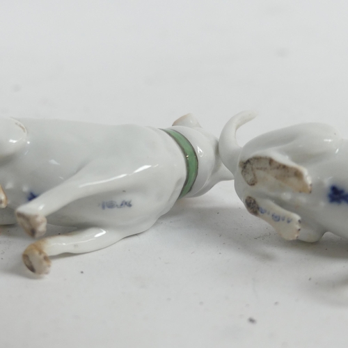 1097 - A group of 3 Meissen porcelain dog figurines, all stamped to the underside with crossed blue swords,... 