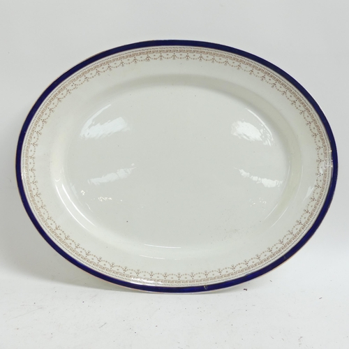 343 - 3 meat plates, including a Victorian Davenport blue and white plate with town scene, 46cm