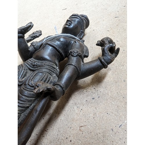 564 - A bronze sculpture of Indian deity Vishnu, on a stand with lotus leaf decoration, H31cm