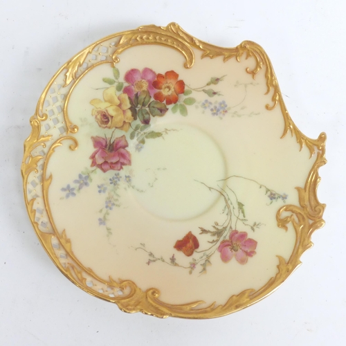 1075 - A Royal Worcester Blush Ivory Empress tea cup and saucer,  decorated with sprays of flowers, with pi... 