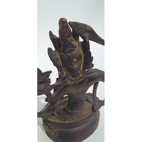 12 - A Tibetan cast-bronze figure of Manjushri, H23cm