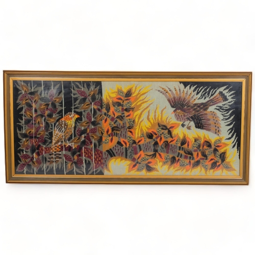 105 - A mid-century French woolwork picture of stylised birds, framed, 121 x 55cm