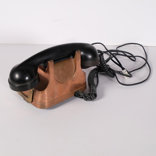 142 - A vintage FTR copper and brass body dial telephone