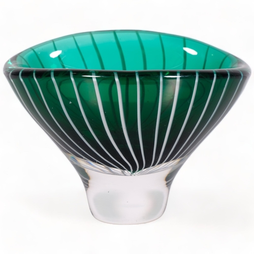 168 - Vicke Lindstrand for Kosta, a small oval shaped bowl in dark green glass with white
milk glass cane ... 