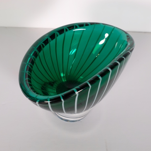 168 - Vicke Lindstrand for Kosta, a small oval shaped bowl in dark green glass with white
milk glass cane ... 