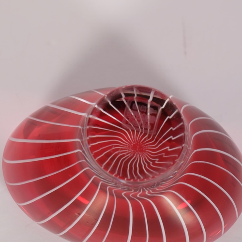 169 - Vicke Lindstrand for Kosta, a small oval shaped bowl in ruby red glass overlain with white milk glas... 