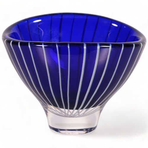 170 - Vicke Lindstrand for Kosta, a small oval shaped bowl in blue glass overlain with white milk glass ca... 