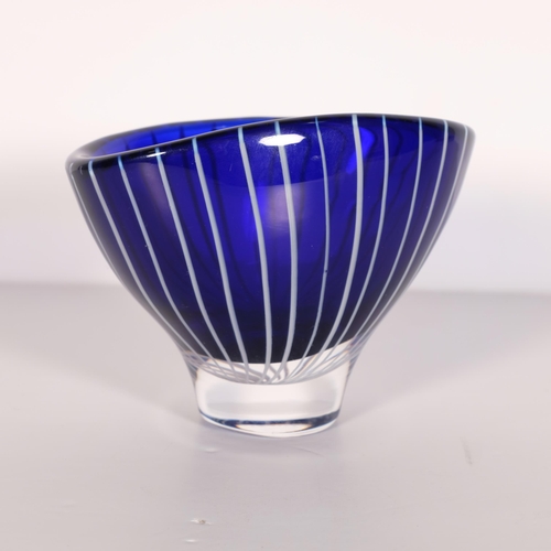 170 - Vicke Lindstrand for Kosta, a small oval shaped bowl in blue glass overlain with white milk glass ca... 