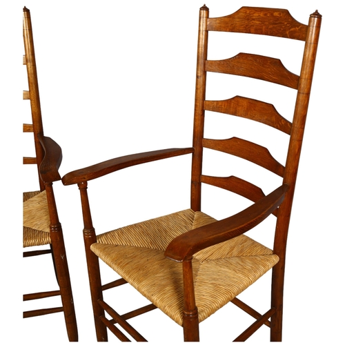 2 - Lawrence Neal, Stockton, a pair of hand made Clisset Nr 2b armchairs in oak with rush seats, purchas... 