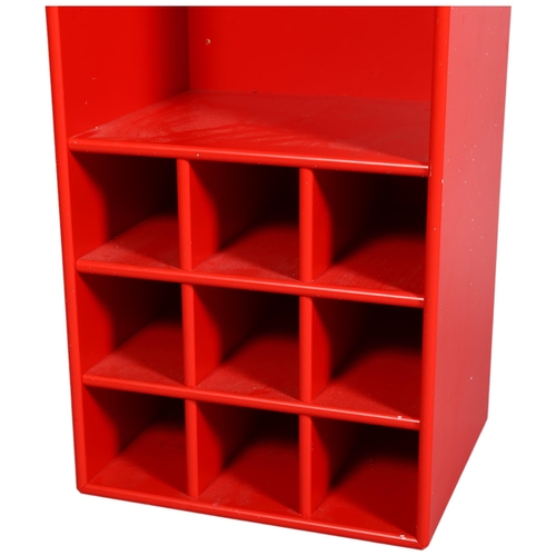 20 - Montana Furniture, Denmark, a wall-hanging wine storage/kitchen cabinet in red lacquer, length 70cm,... 