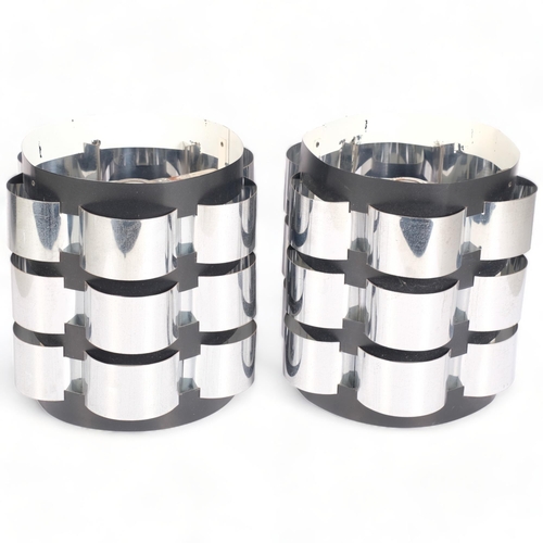 202 - Attributed to Werner Schou, a pair of 1970s, aluminium, ceiling lampshades, height 21cm