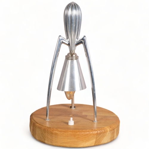 211 - A Philippe Starck aluminium juicer, converted into a table lamp on oak base, 33cm