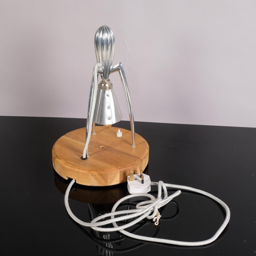 211 - A Philippe Starck aluminium juicer, converted into a table lamp on oak base, 33cm