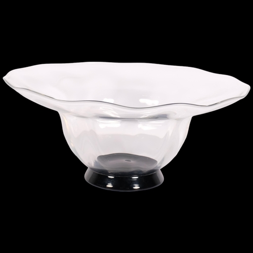 231 - Simon Gate for Orrefors, a clear glass centre bowl with black glass foot, circa 1930s design, marked... 