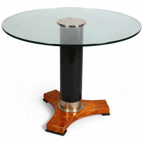 75 - A mid/late 20th century Hollywood Regency style table, glass top on ebonised and burr wood base, hei... 