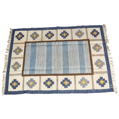 83 - Ida Rydelius, Sweden, a double sided flat weave Rollakan rug, central blue shaded panel, with geomet... 