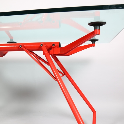 90 - Sir Norman Foster, a Nomos desk by Tecno, this example commissioned in red for a London Ferrari show... 