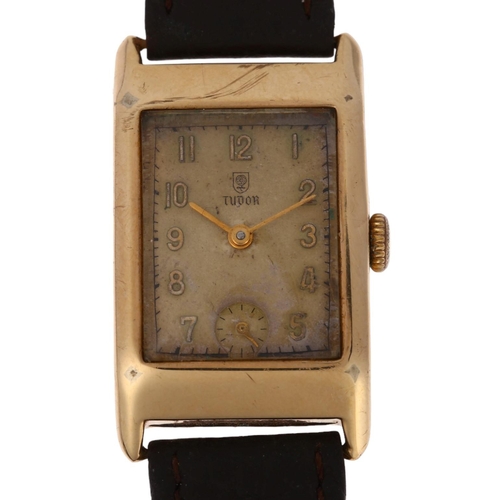1014 - TUDOR - a Vintage 9ct gold mechanical wristwatch, circa 1940s, rectangular silvered dial with applie... 