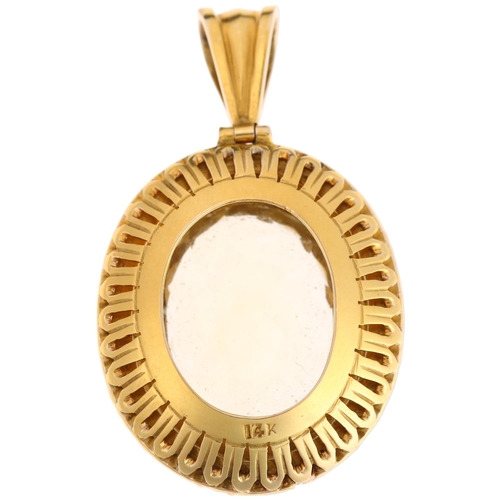 1108 - A 14ct gold citrine and whole pearl oval cluster pendant, centrally claw set with 27ct oval mixed-cu... 