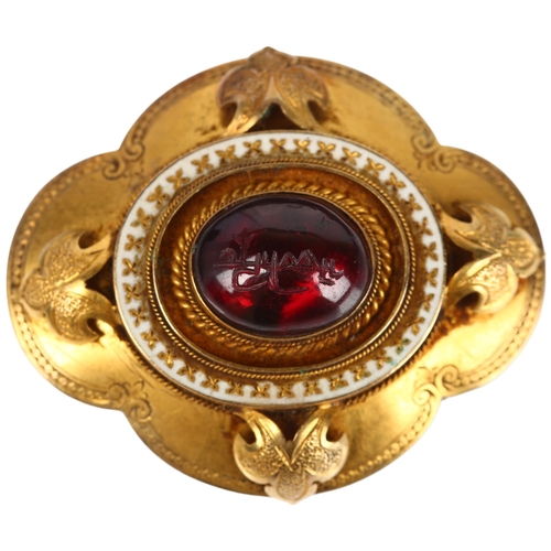 1115 - A Victorian garnet memorial brooch, centrally rub-over set with foil-back oval cabochon garnet, with... 