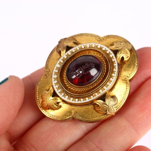 1115 - A Victorian garnet memorial brooch, centrally rub-over set with foil-back oval cabochon garnet, with... 