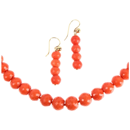 1117 - A Georgian graduated faceted coral bead necklace and earring set, beads ranging from 11.6-8.1mm, gol... 