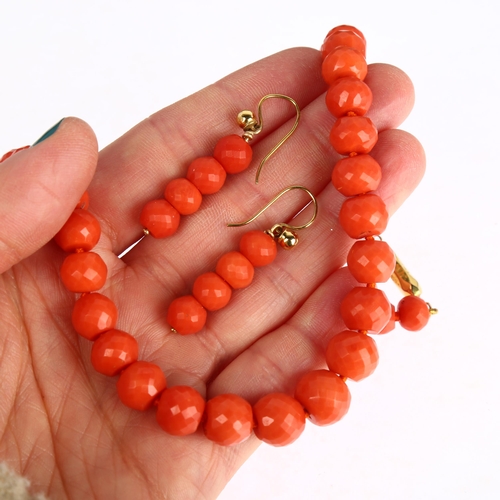 1117 - A Georgian graduated faceted coral bead necklace and earring set, beads ranging from 11.6-8.1mm, gol... 