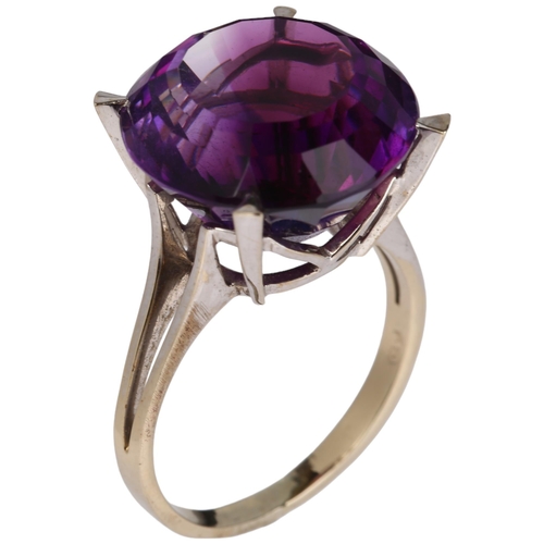 1118 - An 18ct white gold solitaire amethyst ring, claw set with 15ct round step-cut amethyst, amethyst wei... 