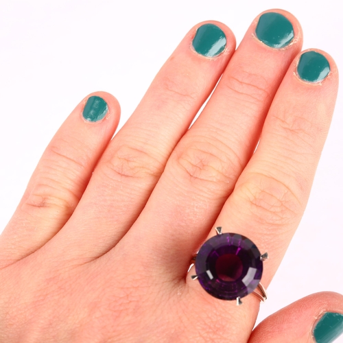 1118 - An 18ct white gold solitaire amethyst ring, claw set with 15ct round step-cut amethyst, amethyst wei... 