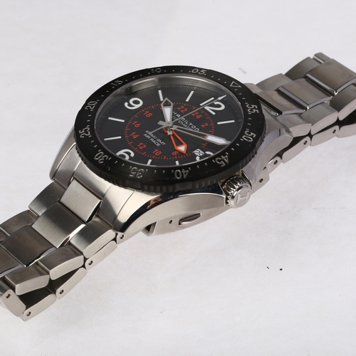 1031 - HAMILTON - a stainless steel Khaki GMT Air Race automatic calendar bracelet watch, ref. H767550, bla... 