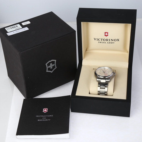 1035 - VICTORINOX - a stainless steel Swiss Army Officer's automatic calendar bracelet watch, ref. 241372, ... 