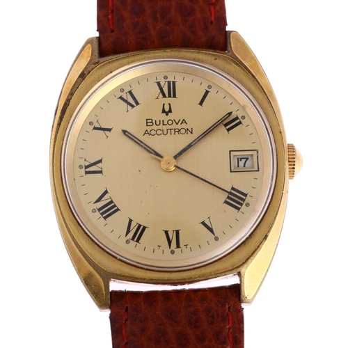 1038 - BULOVA - a gold plated stainless steel Accutron quartz wristwatch, ref. 7303-3, champagne dial with ... 