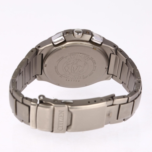 1056 - CITIZEN - a titanium Eco-Drive Skyhawk quartz chronograph bracelet watch, ref. C650-Q02497, black di... 
