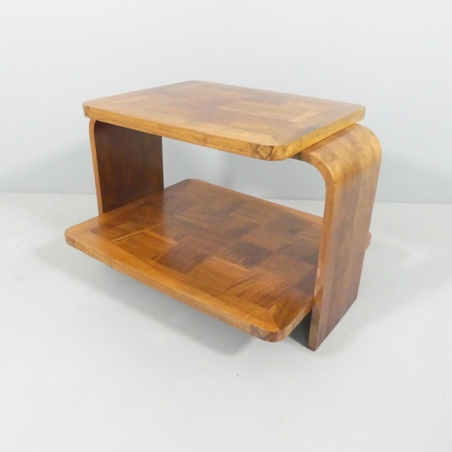 2008 - A 1930s two-tier Art Deco coffee table with geometric parquetry surfaces. 76x54x58.5cm.