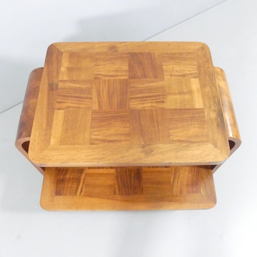 2008 - A 1930s two-tier Art Deco coffee table with geometric parquetry surfaces. 76x54x58.5cm.