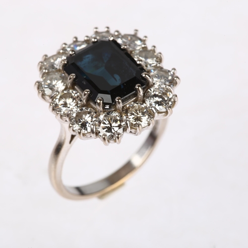 1157 - An 18ct white gold sapphire and diamond rectangular cluster ring, maker JHL, London 1973, claw set w... 