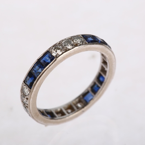 1158 - An 18ct white gold sapphire and diamond full eternity ring, London 1975, set with calibre-cut sapphi... 