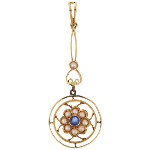 1164 - An Edwardian sapphire and pearl openwork drop pendant, gold settings with central flowerhead motif, ... 