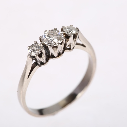 1170 - A three stone diamond ring, claw set with round brilliant-cut diamonds, total diamond content approx... 